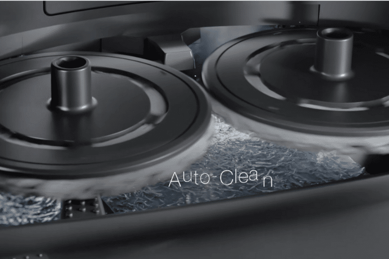The washing process of the mopping pads in the cleaning station is shown